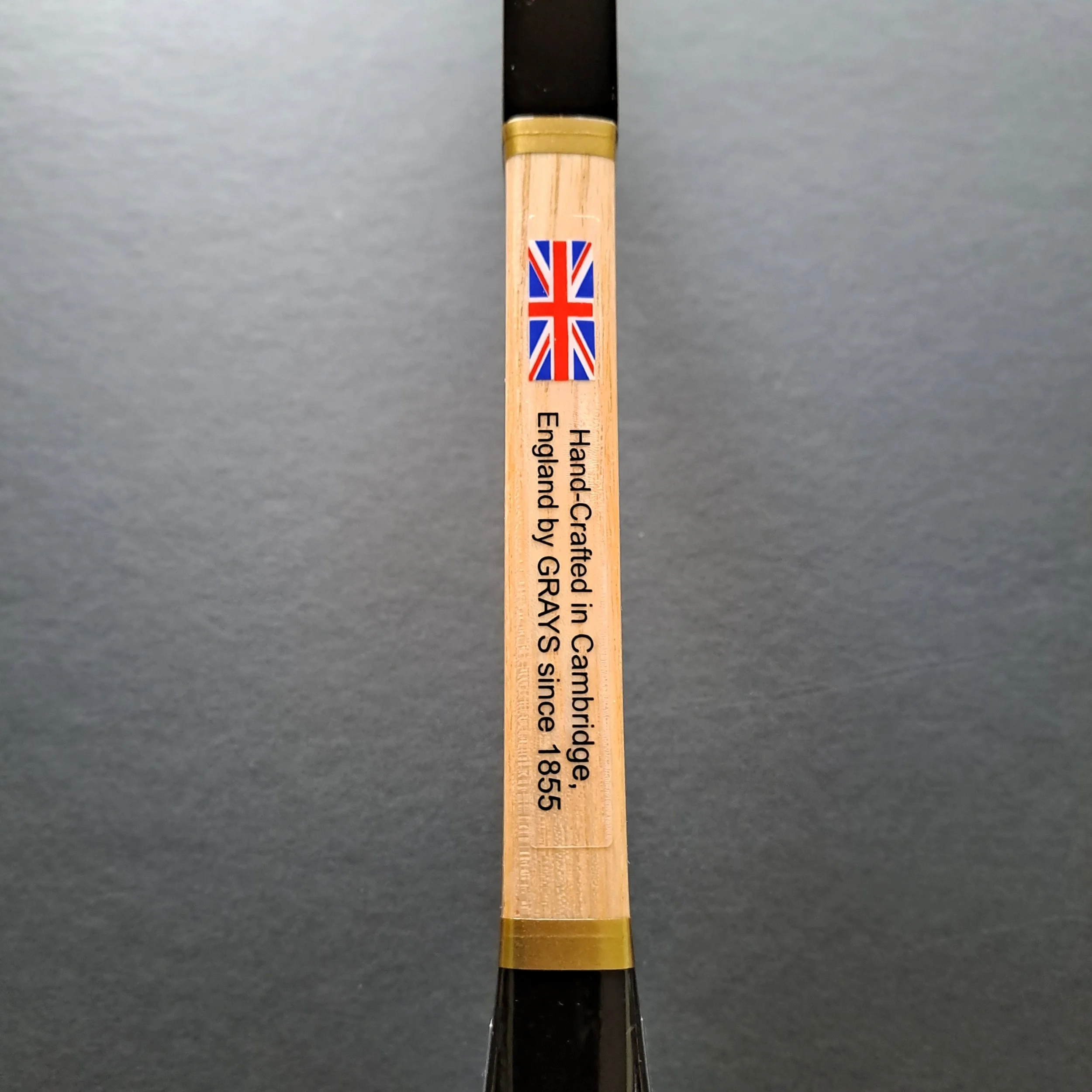 Side shaft of a Grays The Masterpiece showing a label with text and featuring the Union Jack flag.