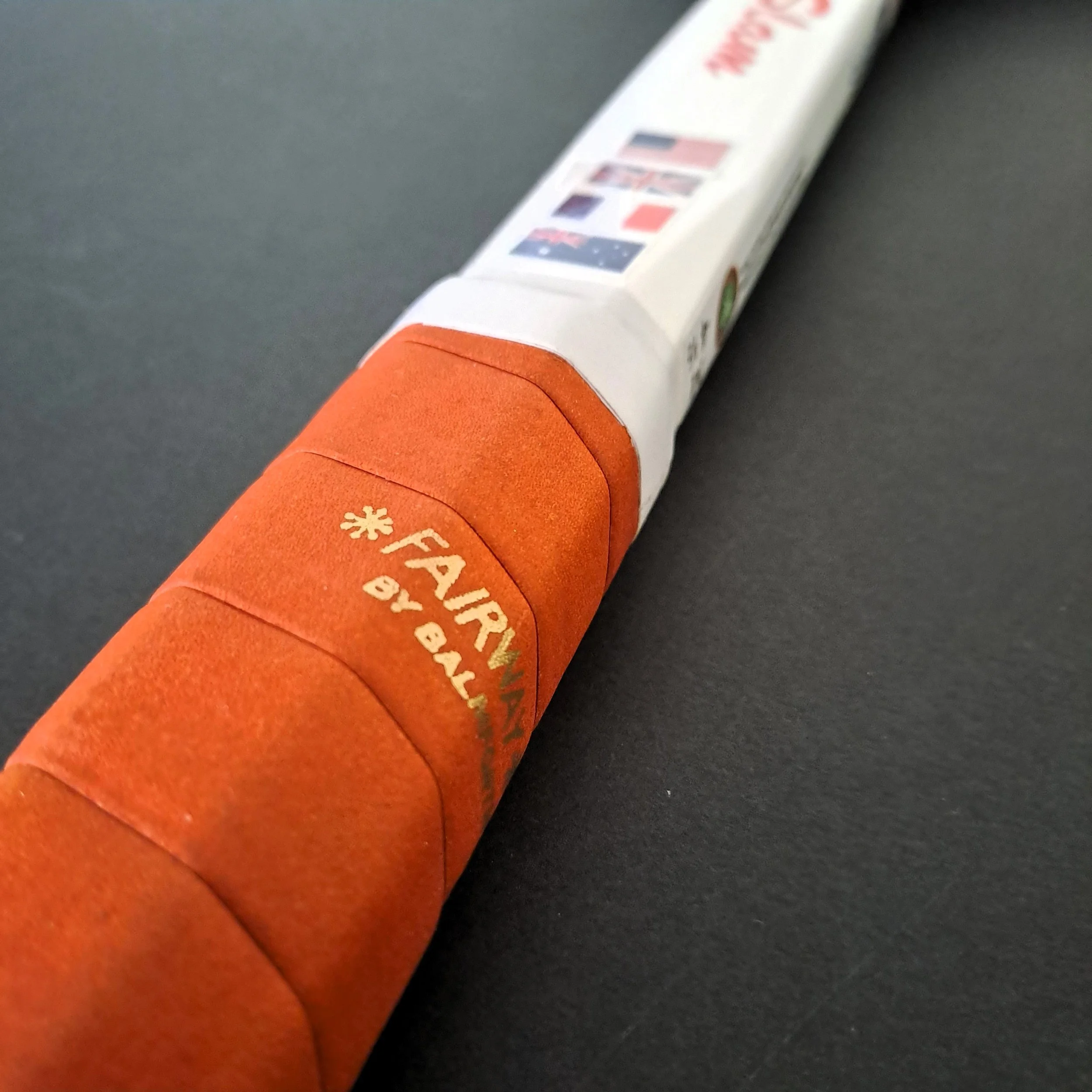 Close-up of Grays Slam grip and lower shaft with cosmetics.