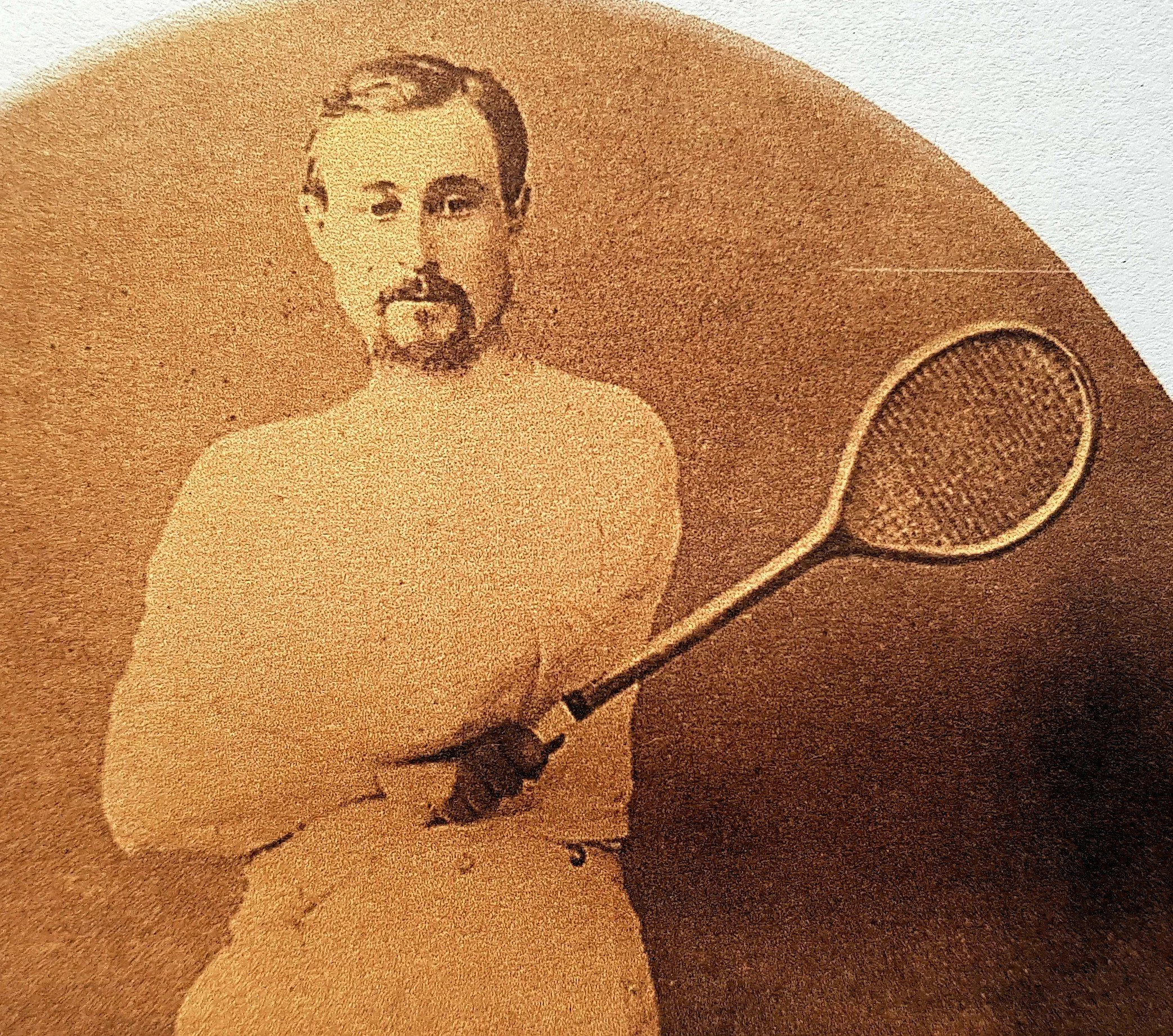 Image of H.J. Gray, company founder, holding a Rackets racket.