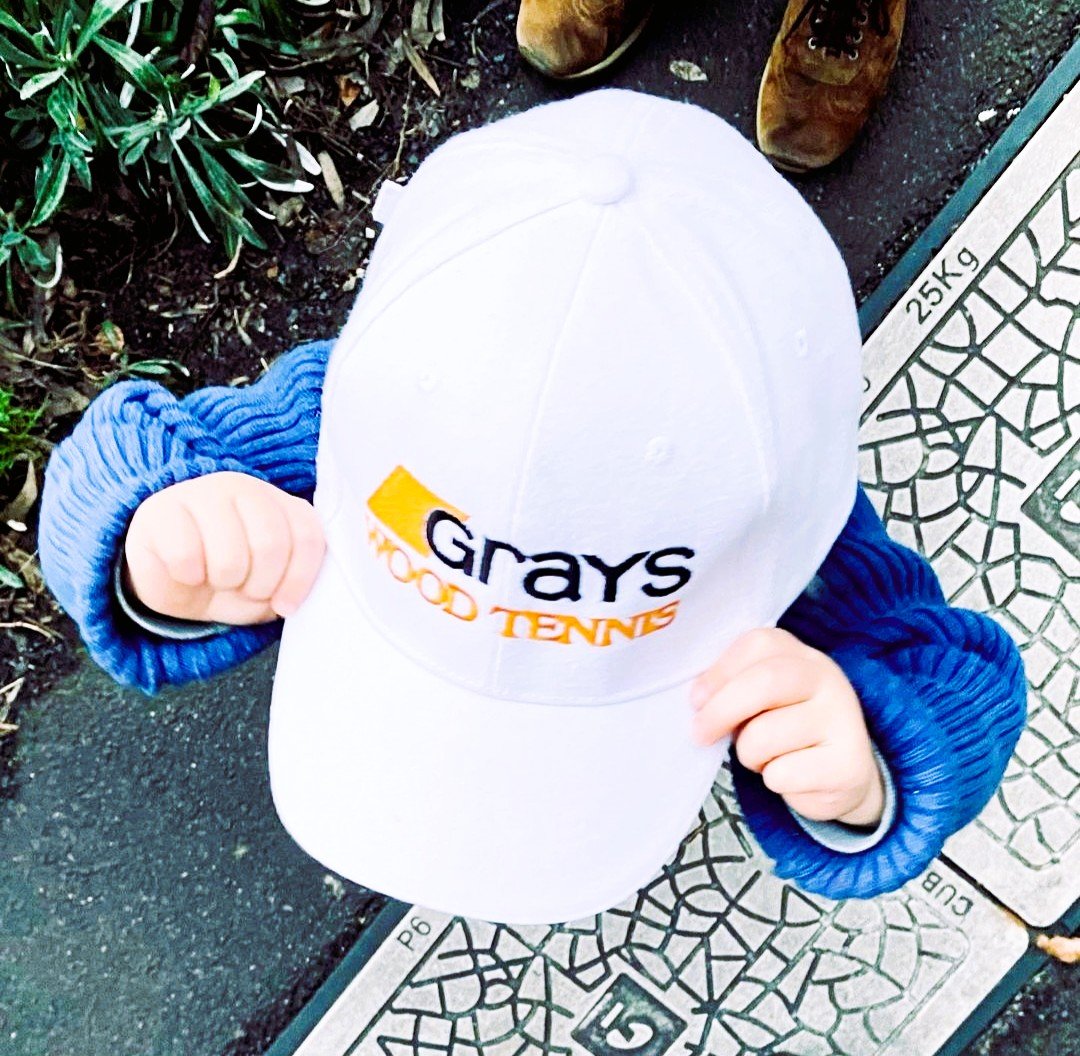Grays Wood Tennis cap on child's head.