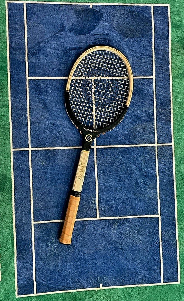 Grays Masterpiece wooden racket against a tennis court image.