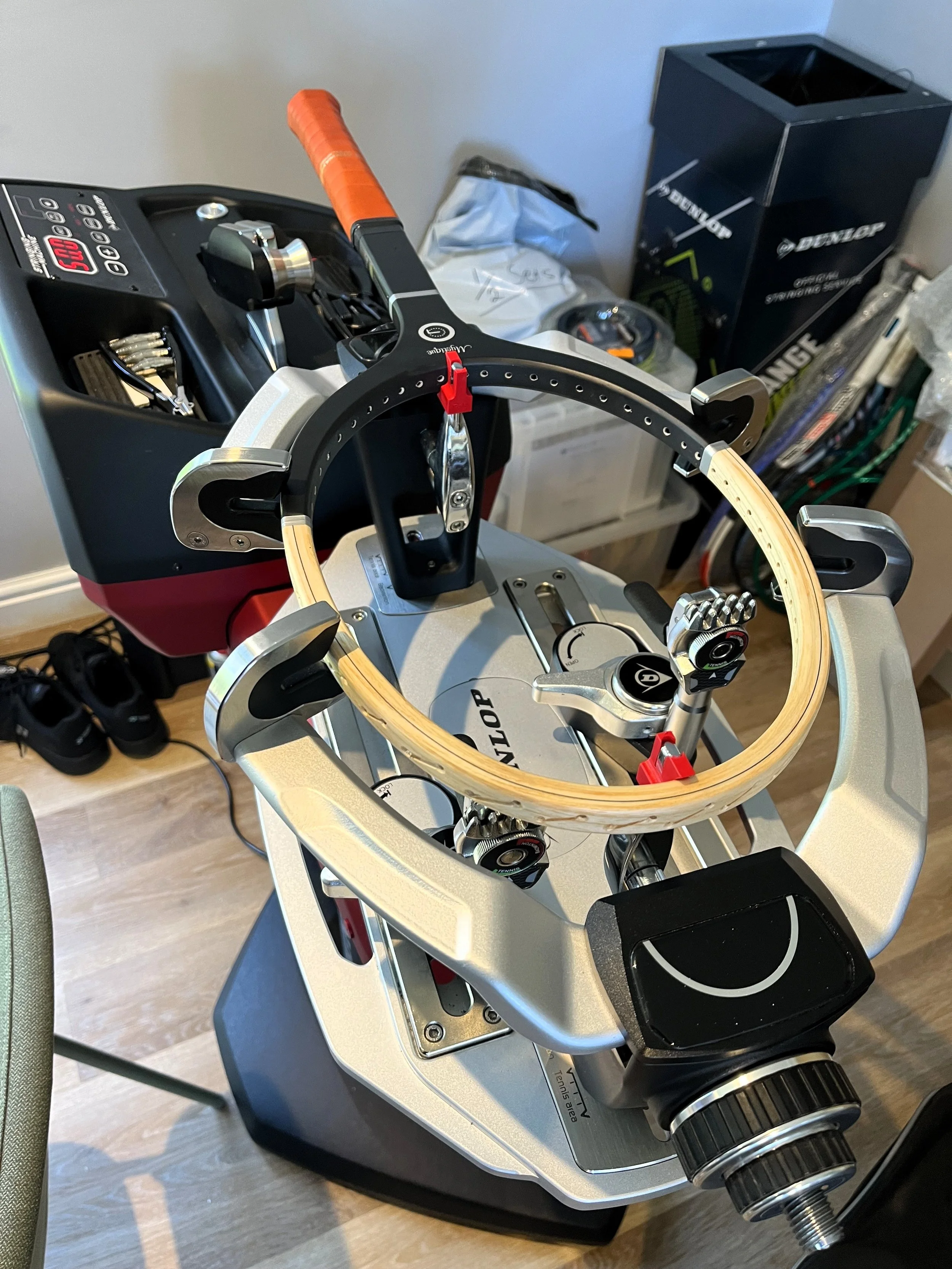 Mystique frame on a stringing machine.