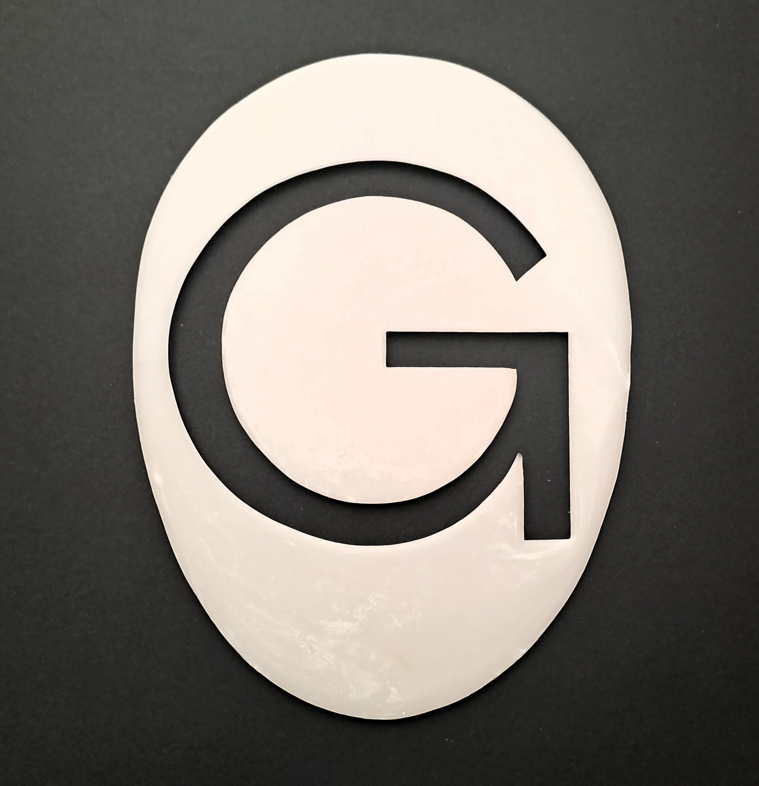 White Grays stencil against black background
