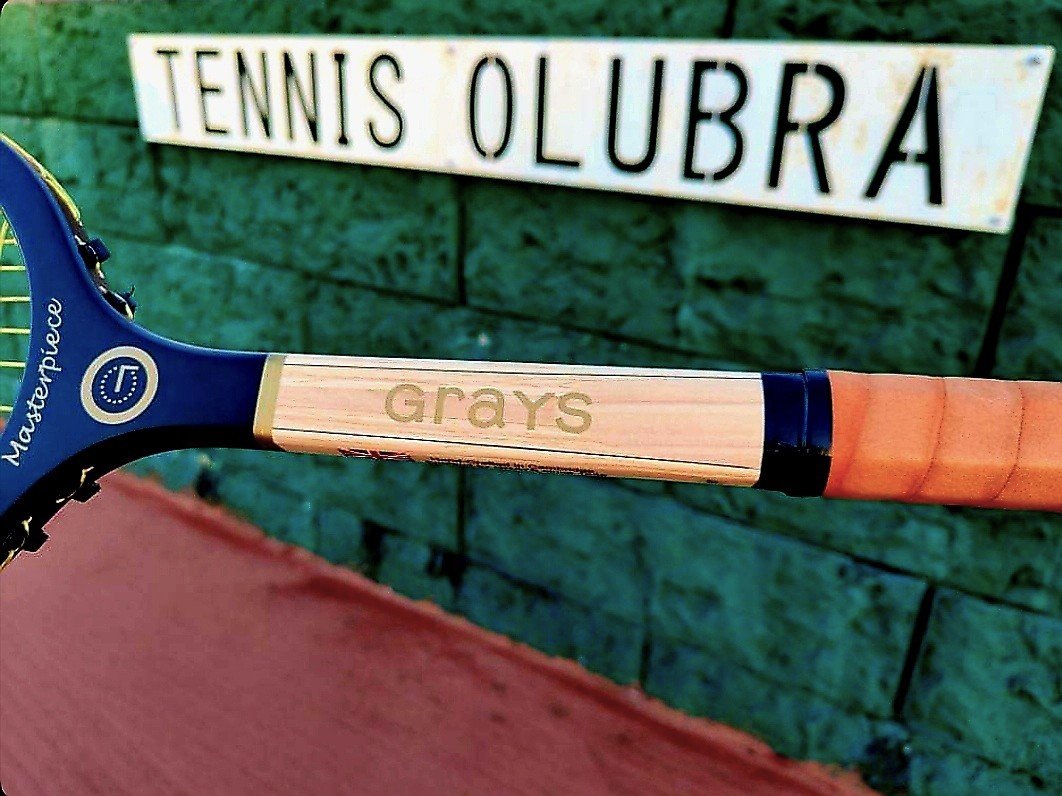 Grays Masterpiece in the air on front of Tennis Olubra sign.