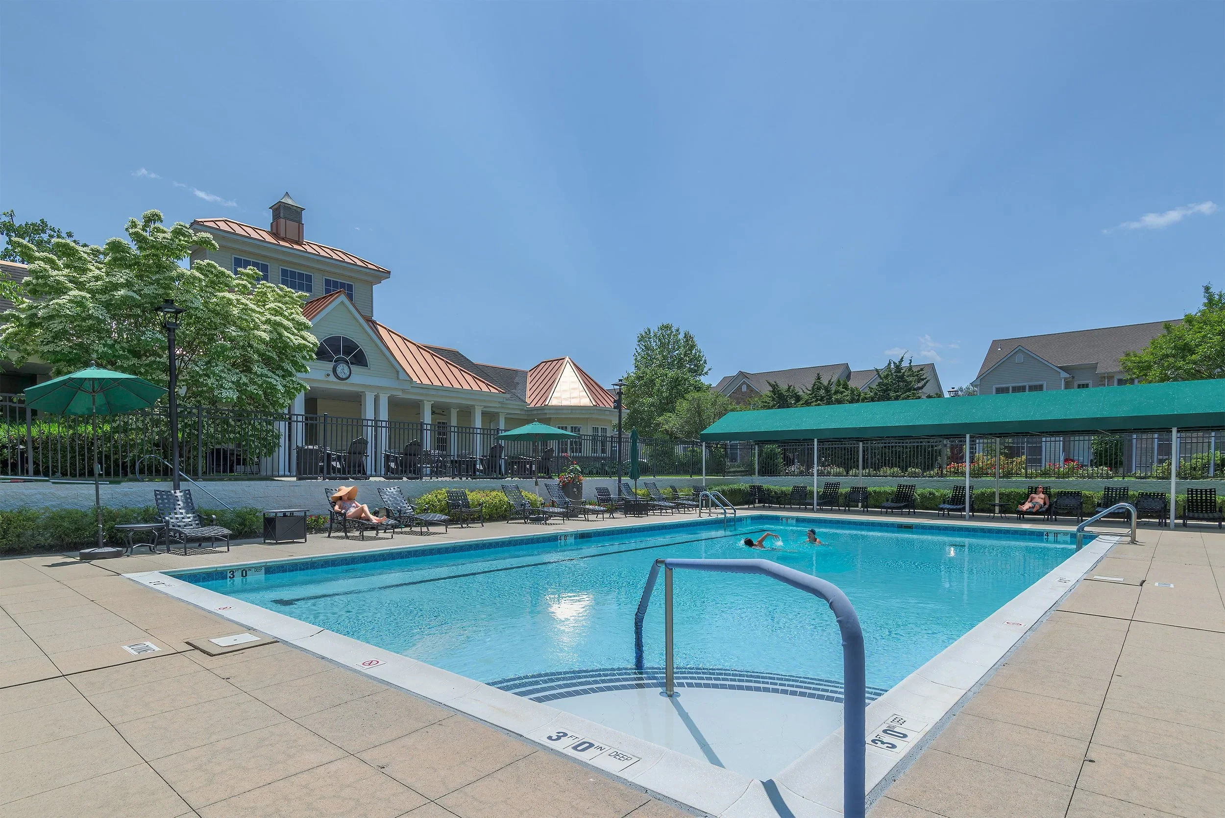 outdoor-community-pool-apartment-amenities.webp