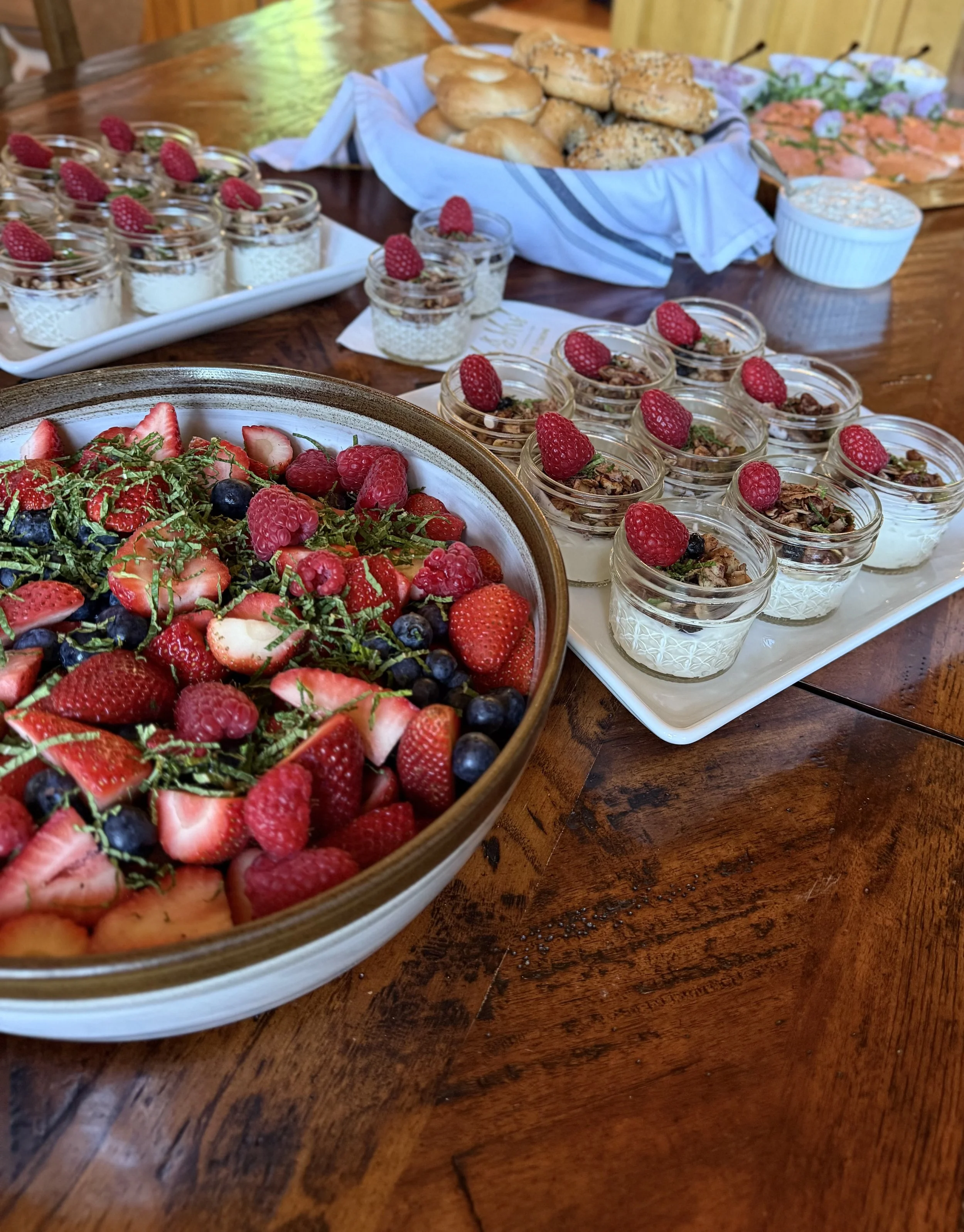 A bountiful bowl of fresh berries and a fruit salad