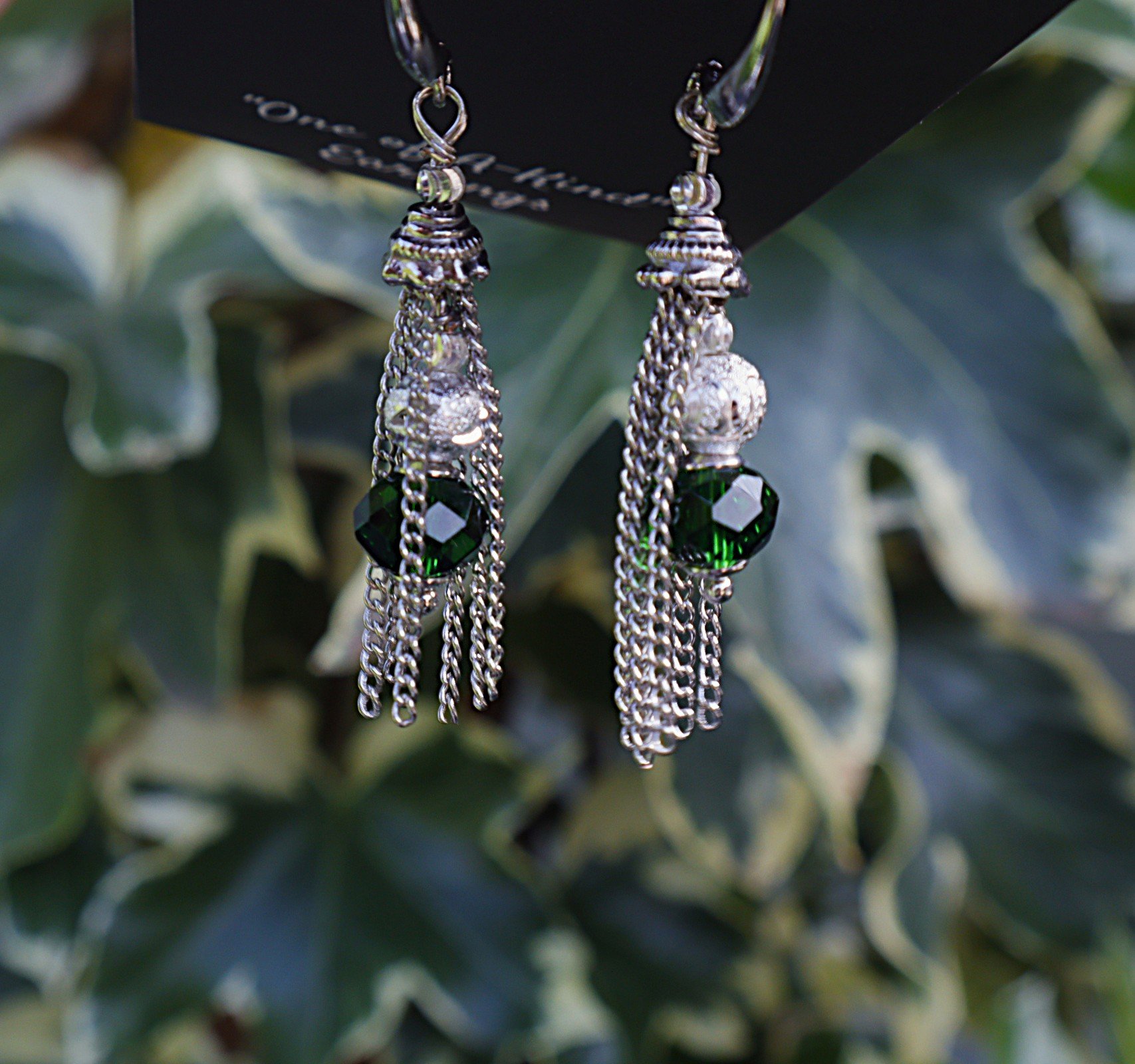 Luxe Silver Tassel Earrings with Emerald Crystals