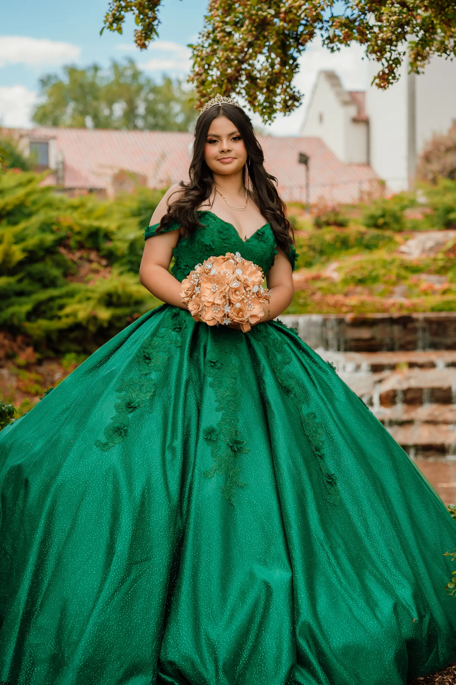 Quinceañera in an emerald gown