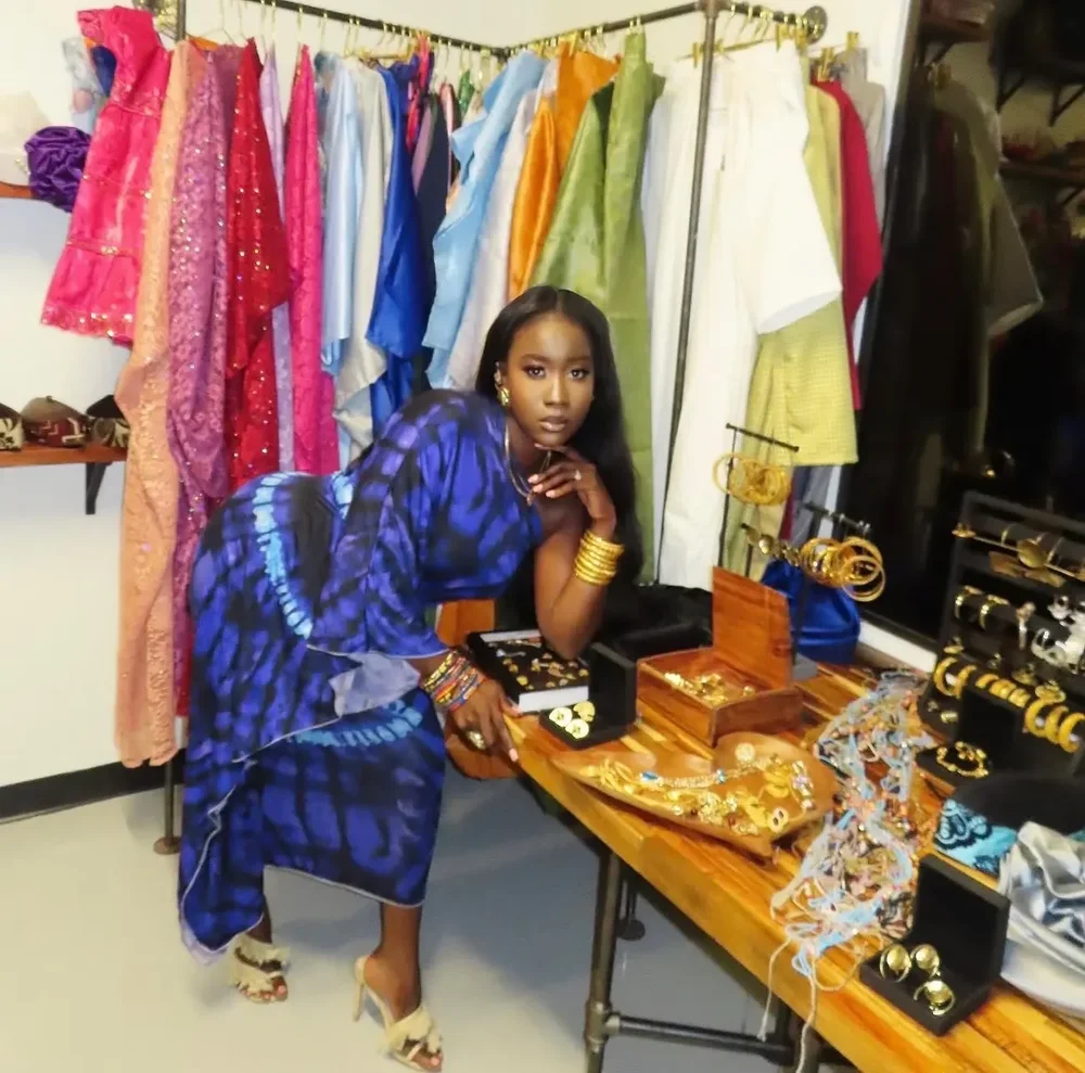 Adja among the racks in her Nashville boutique