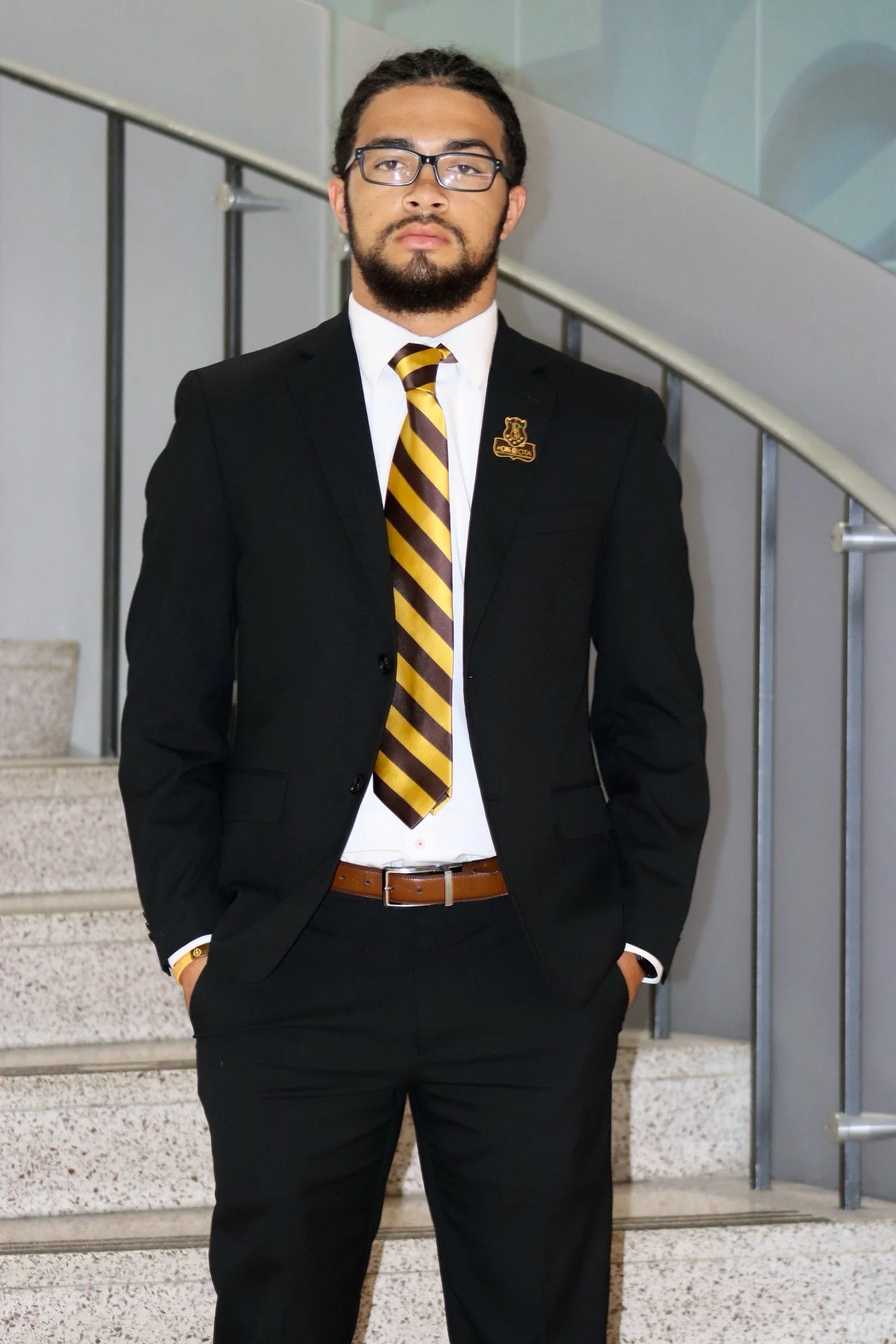 Photo of Dylan Noble, a white man, wearing a black shirt