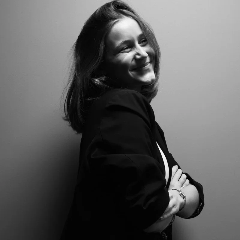 Picture of Alex Vitat, a white man, wearing a white dress shirt and a blue suit jacket