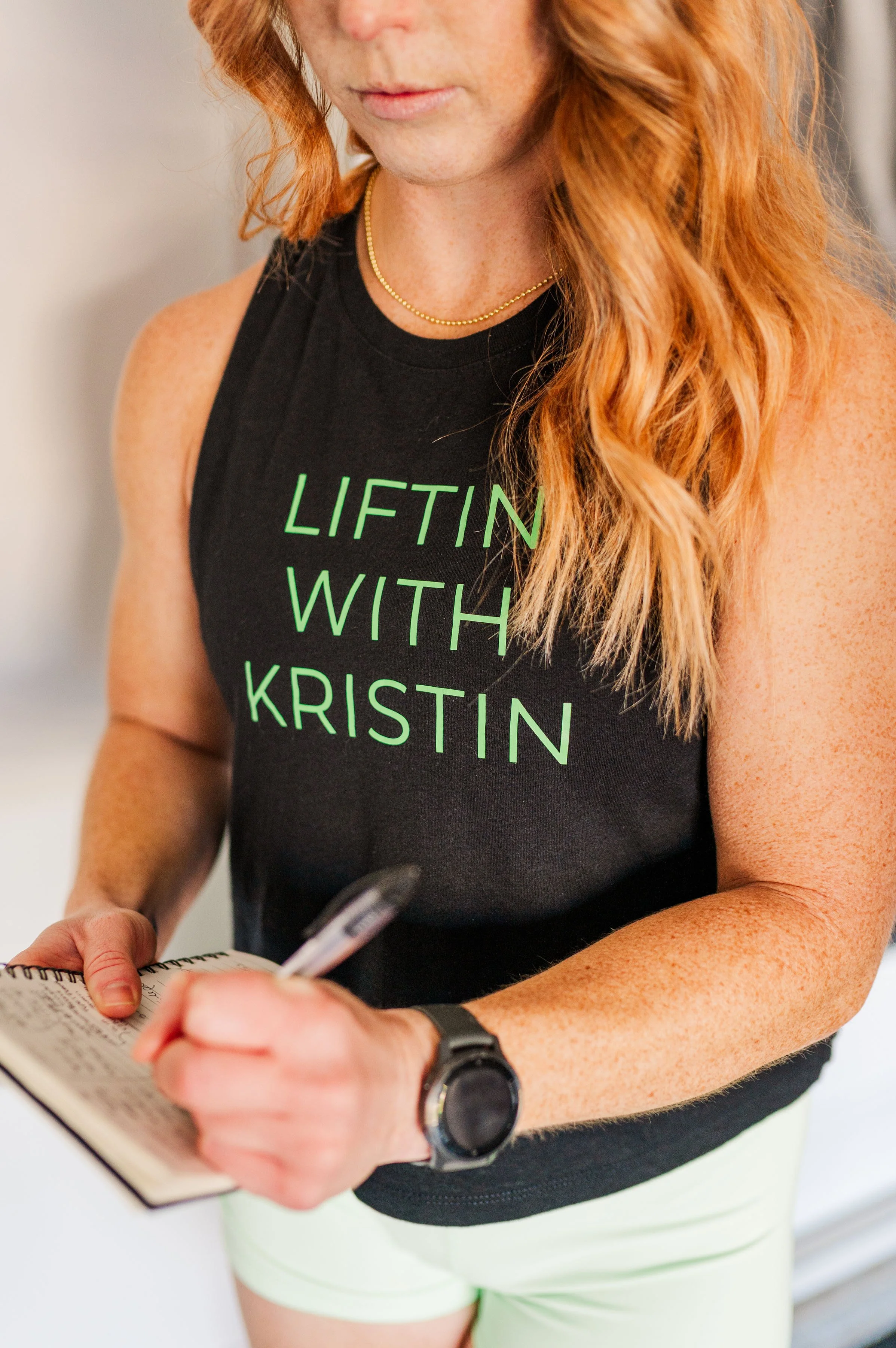 up close liftin with kristin shirt and notebook.jpeg