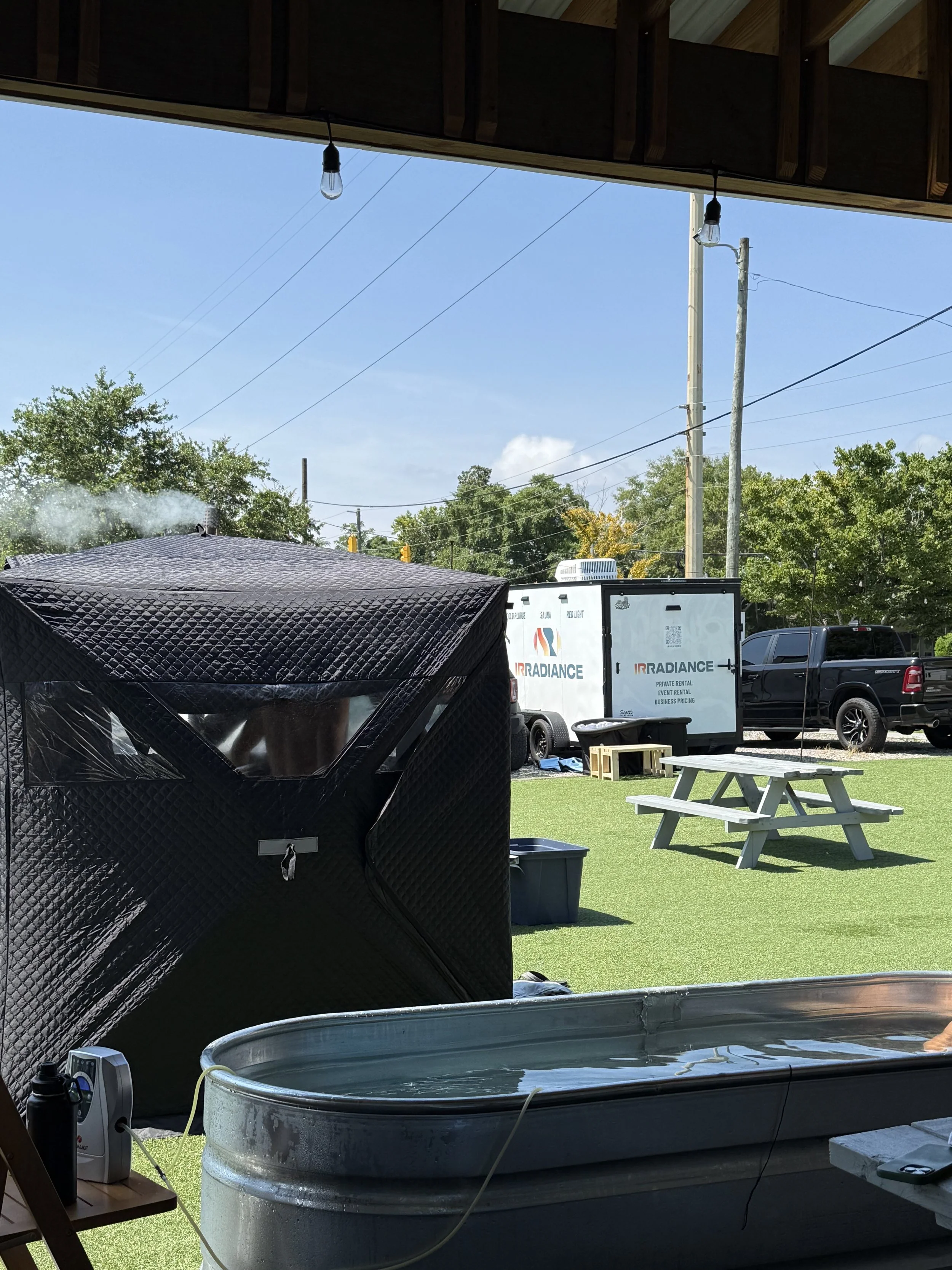(IR) past mobile on-site set up of cold plunge and sauna.