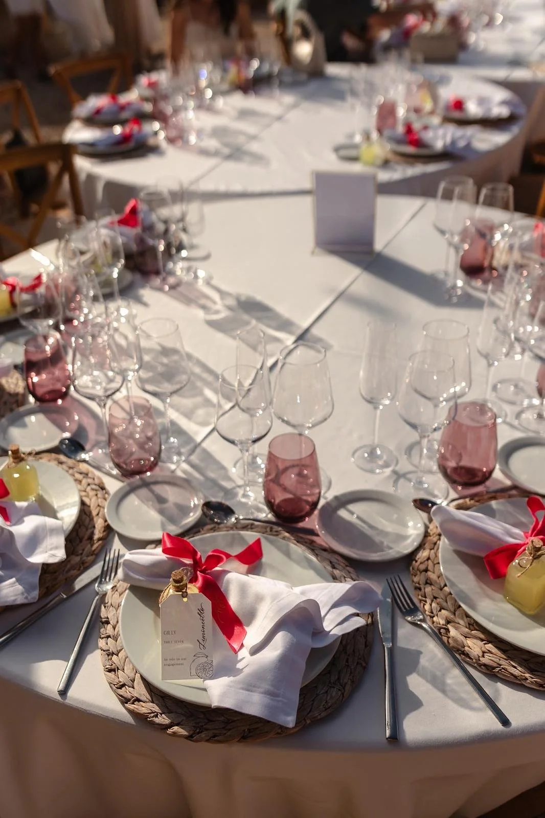 Mallorca wedding stationery and signage. Limocello shot bottles and personalised ribbons
