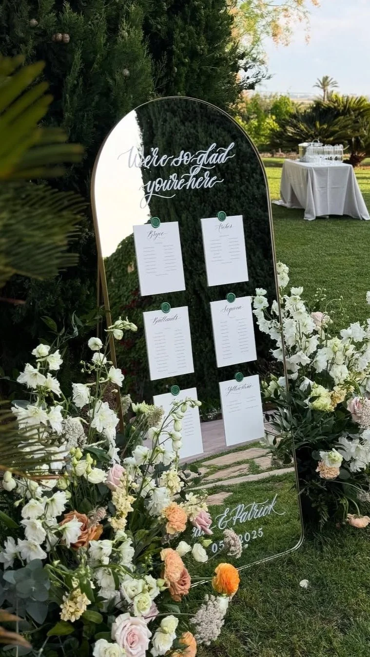 Mallorca wedding seating plan mirror. Written by hand. Wedding Calligraphy