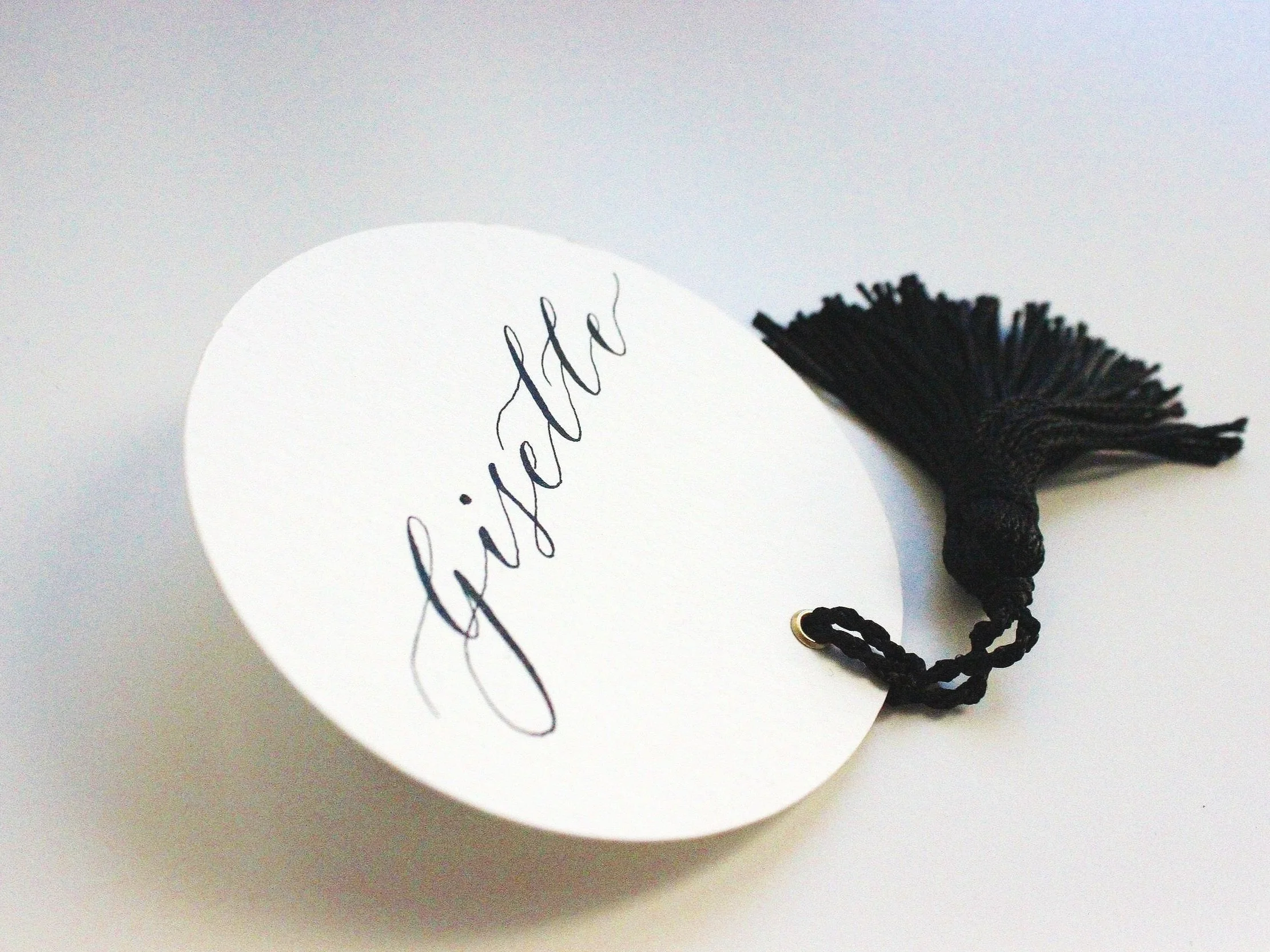 Hand written place card. Wedding stationery and signage Mallorca. Wedding calligraphy