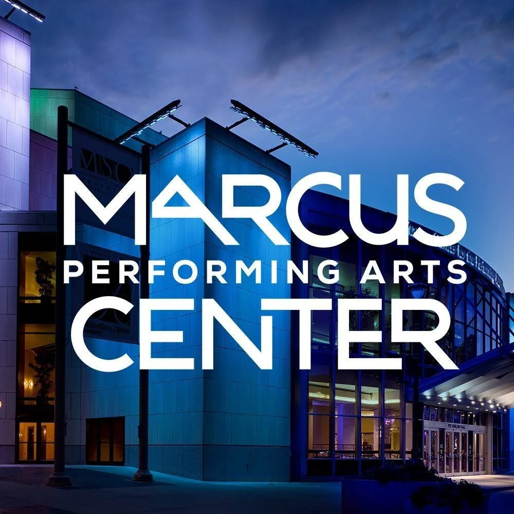 Marcus Performing Arts Center logo. White text over photo of venue exterior.