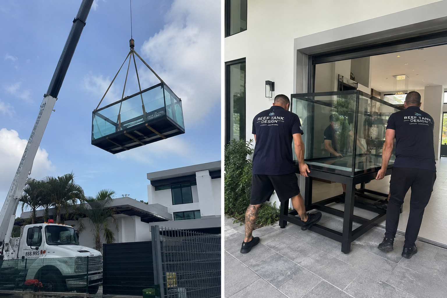 Workers installing a large glass aquarium inside a modern house with white walls and large windows. One worker is guiding the aquarium while the other is nearby, both wearing black shirts with 'Reef Tank Design' printed on the back. A crane lift is lowering the aquarium from above.