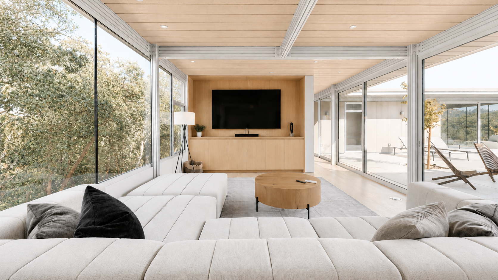 Luxury living room furnished with neutral FF&E, furniture selection, procurement coordination, and installation support for a refined residential property.