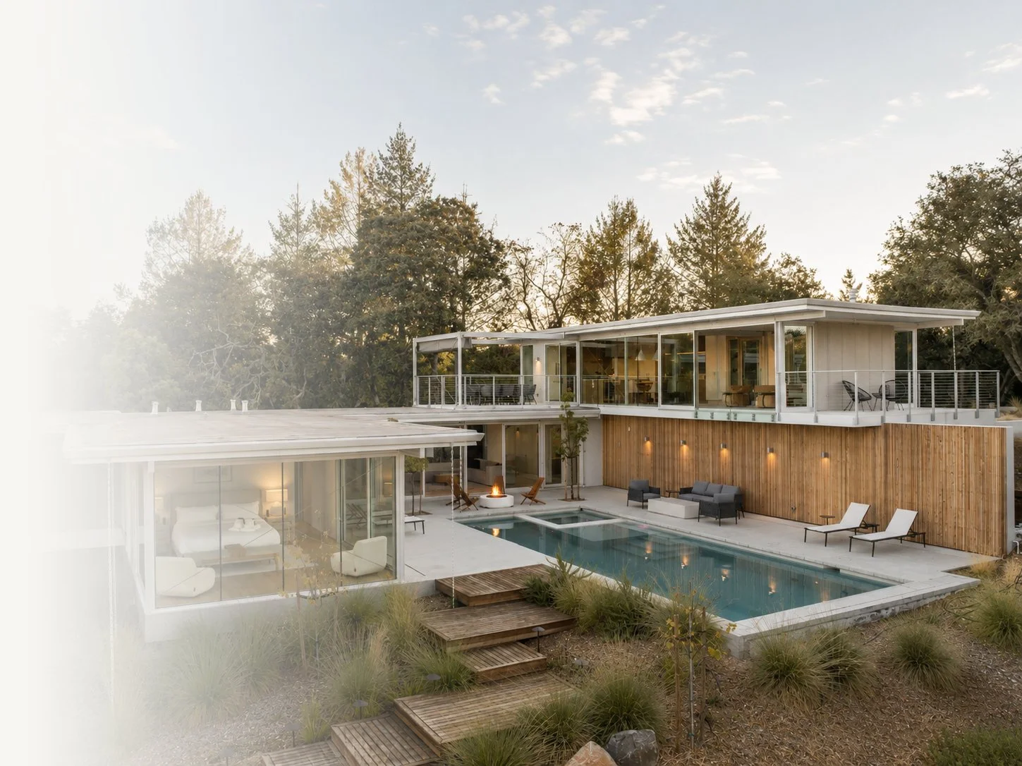 Luxury modern residence with pool and outdoor lounge area, representing Precipice West furnishing, FF&E, procurement, and installation support.