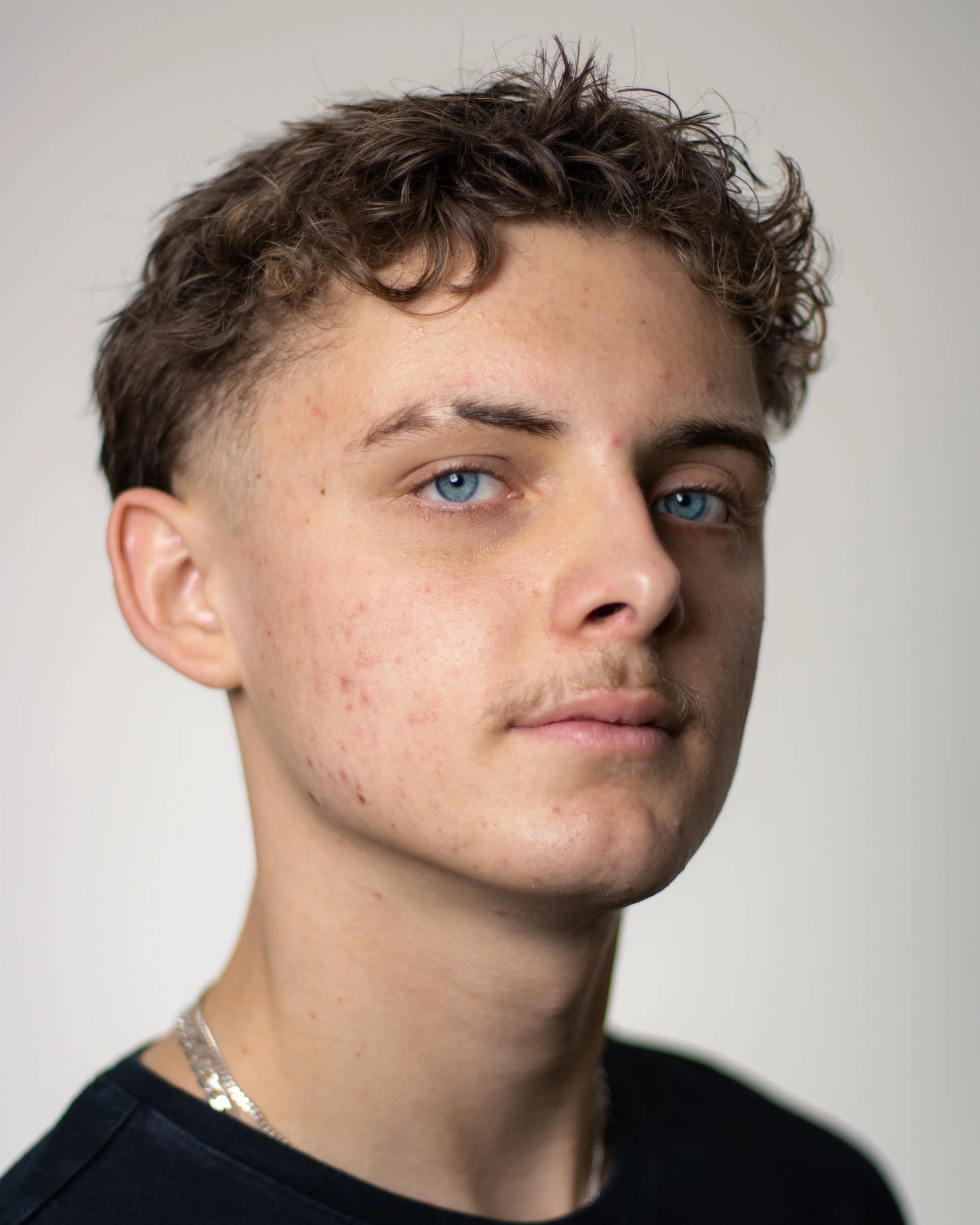 Logan W Headshots-3.jpg