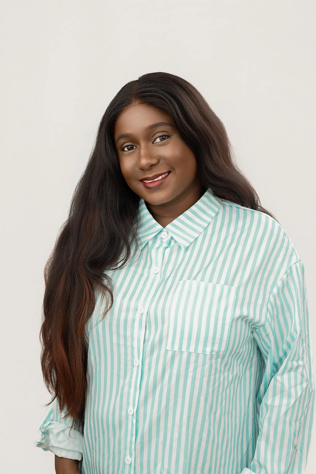 Female African Woman with Blue Pinstripes Headshot for LinkedIn