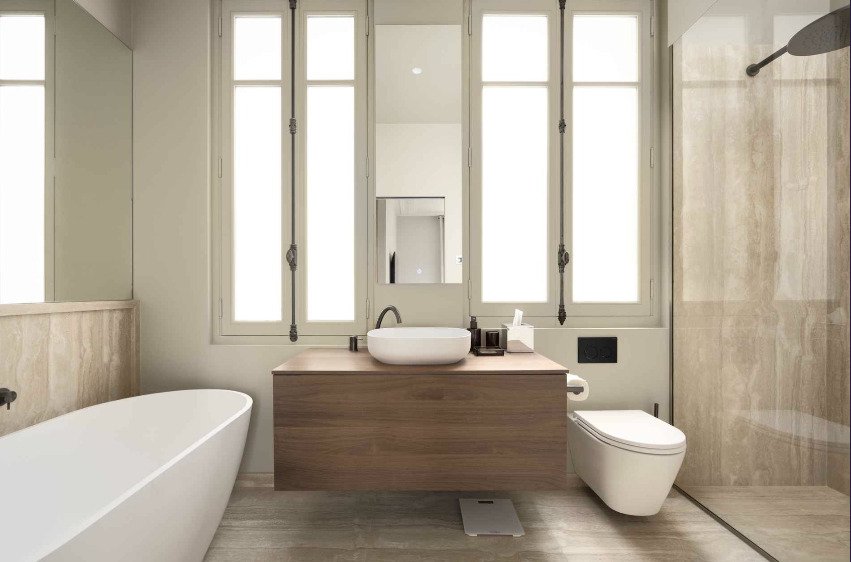Modern bathroom with a freestanding bathtub, wooden vanity with vessel sink, large windows, and walk-in shower with beige tile walls.