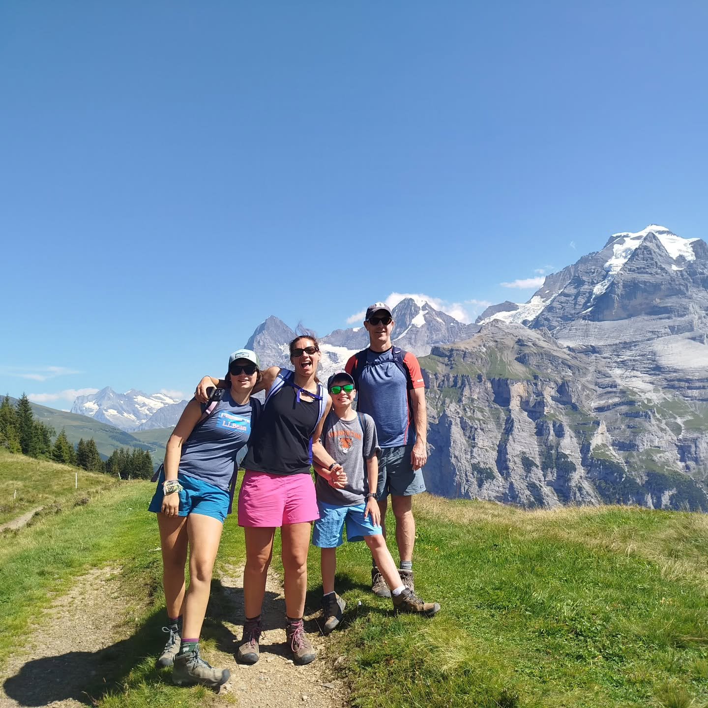 Hiking memories made together. 🌄🥰
Family hikes, quality time far from the crowds, and stunning views of the Eiger, M&ouml;nch and Jungfrau.
.
.
.
.
.
#SwissMountainHikes #FamilyHikes #EigerM&ouml;nchJungfrau #Swissalps #Jungfrauregion 
#HikingSwitz