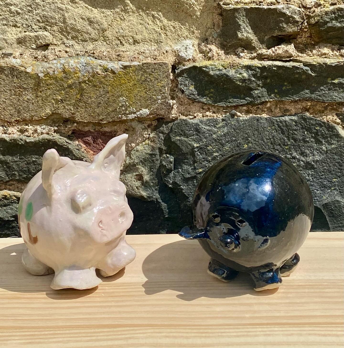 Shiny glazed piggies in the sun again #communitypottery#socialenterprise#cic#scottishpottery#potteryclasses#inclusive#beginnerspottery#potteryworkshops#piggybank