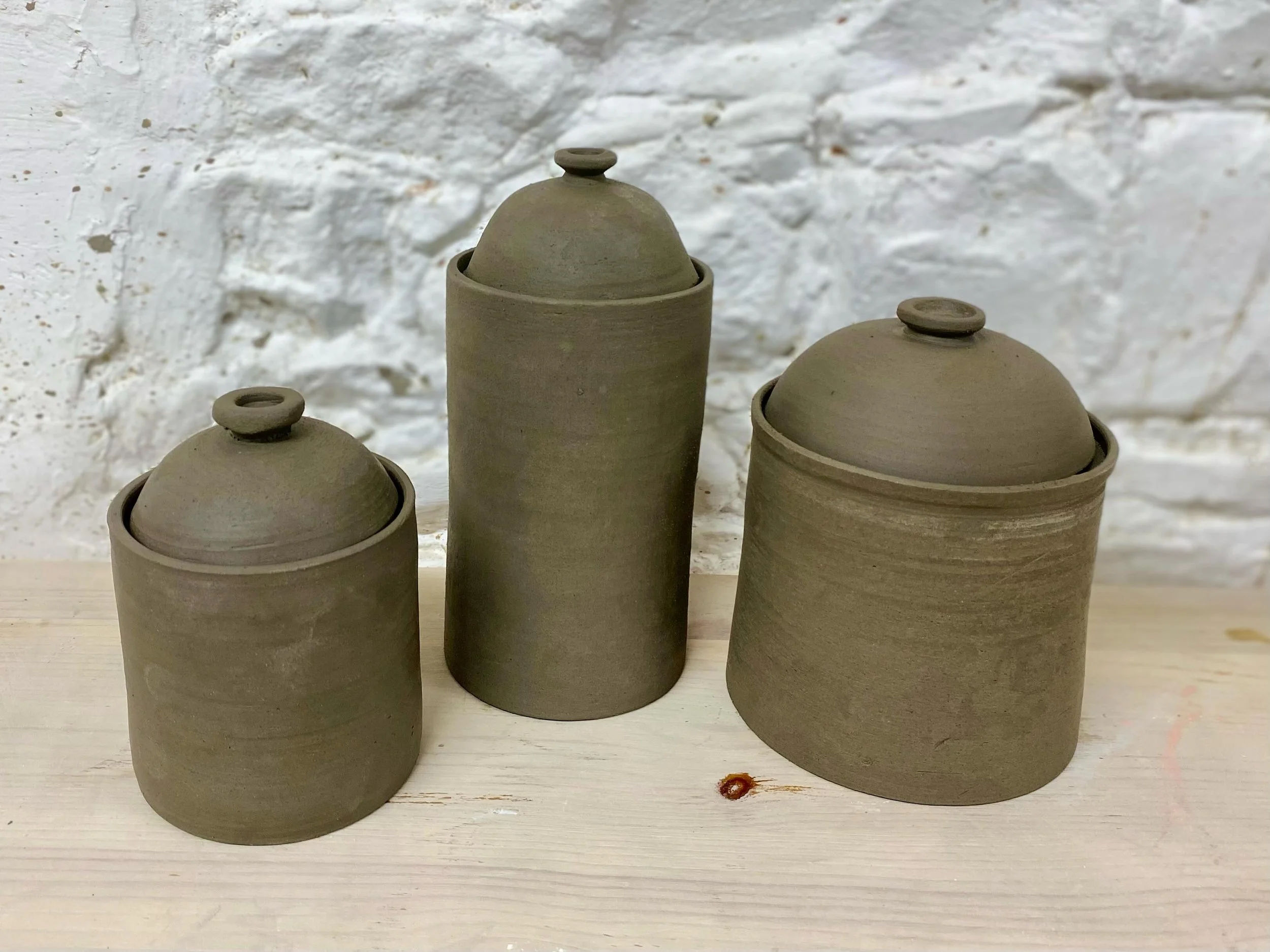 Fun today before the final class of this block finishing different sizes of storage jars and turning knobs. #socialenterprise#inclusive#potteryclasses#stoneware#ceramicstoragejars