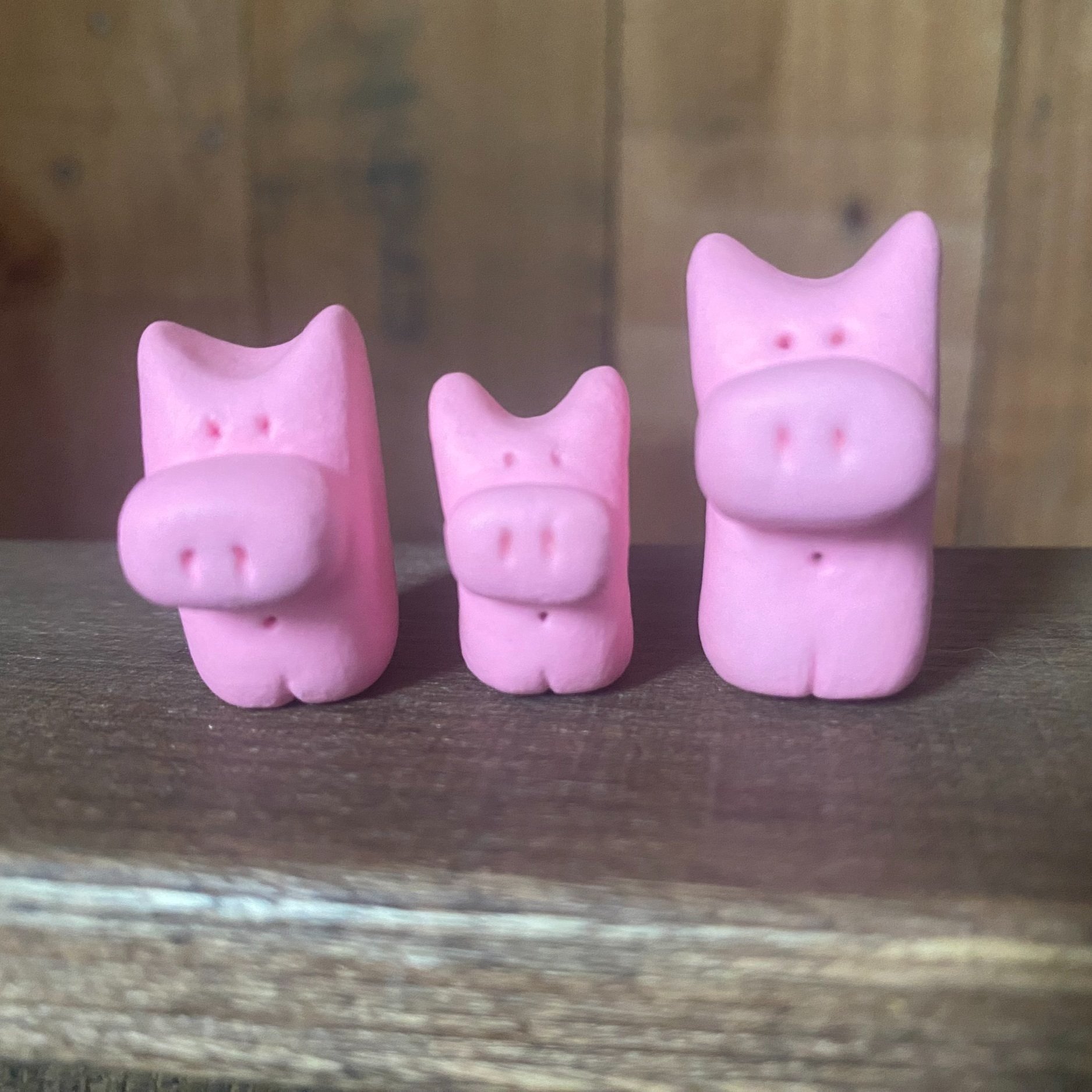 Handmade cute family of pottery pink pigs curly tail