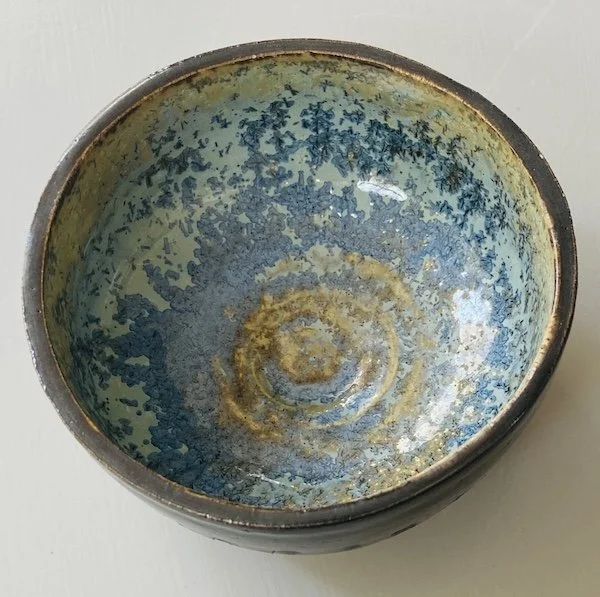 unique, one-off piece, small bowl for serving snacks, dips and olives. Glossy black glaze outside contrasts with natural bare stoneware with a beautiful turquoise, green and crystallised inside.