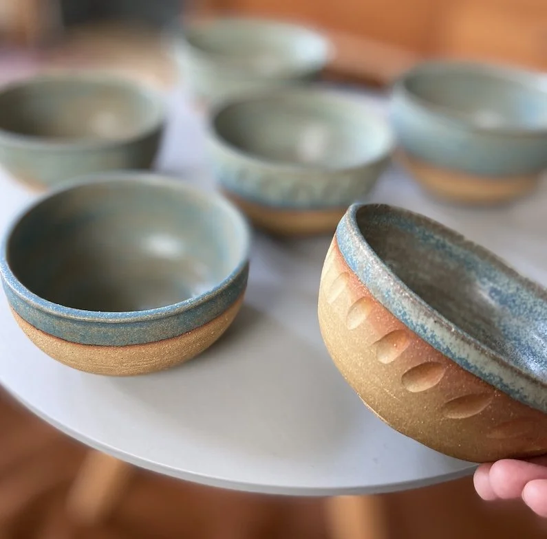 unique hand built small medium bowl. Subtle blue glaze inside half outside toasted buff stoneware, one-off
