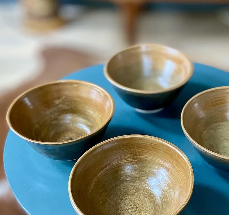 unique hand built small medium bowl. Satin toffee glaze inside with a glossy dark olive effect outside. White stoneware, unique