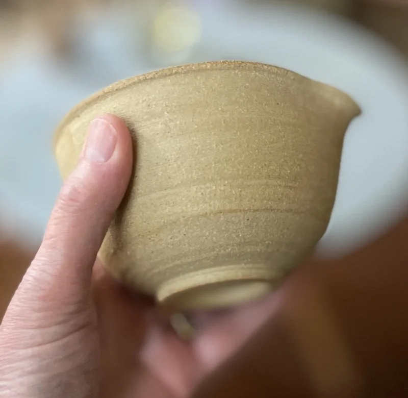 unique, one-off little mixing bowl glossy toffee glaze Natural rough stoneware outside. For salad dressings from kitchen to tableware