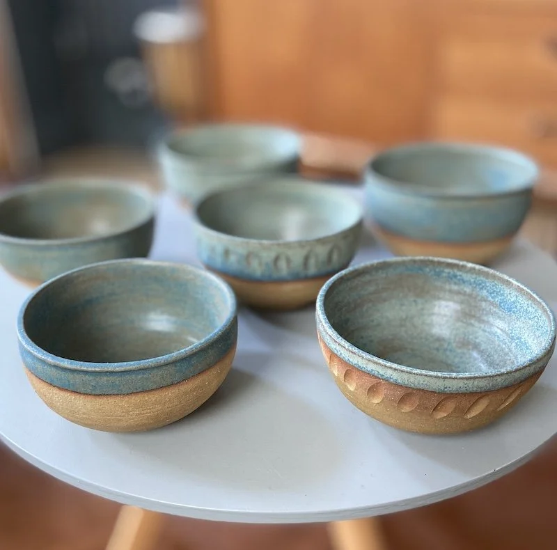 unique hand built medium sized bowl. Subtle blue glaze inside half outside toasted buff stoneware, one-off, hand carved