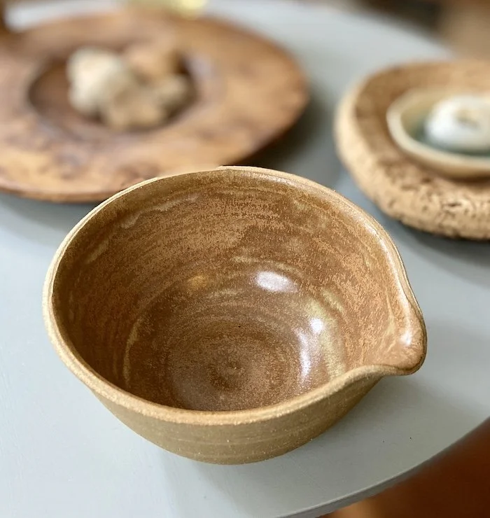unique, one-off little mixing bowl glossy toffee glaze Natural rough stoneware outside. For salad dressings from kitchen to tableware