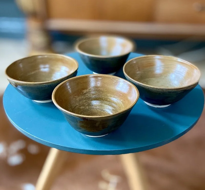 unique hand built small medium bowl. Satin toffee glaze inside with a glossy dark olive effect outside. White stoneware, unique