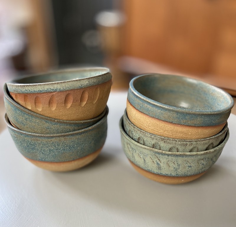 unique hand built small medium bowl. Subtle blue glaze inside half outside toasted buff stoneware, one-off