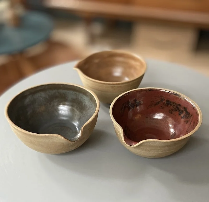 unique, one-off little mixing bowl glossy toffee glaze Natural rough stoneware outside. For salad dressings from kitchen to tableware