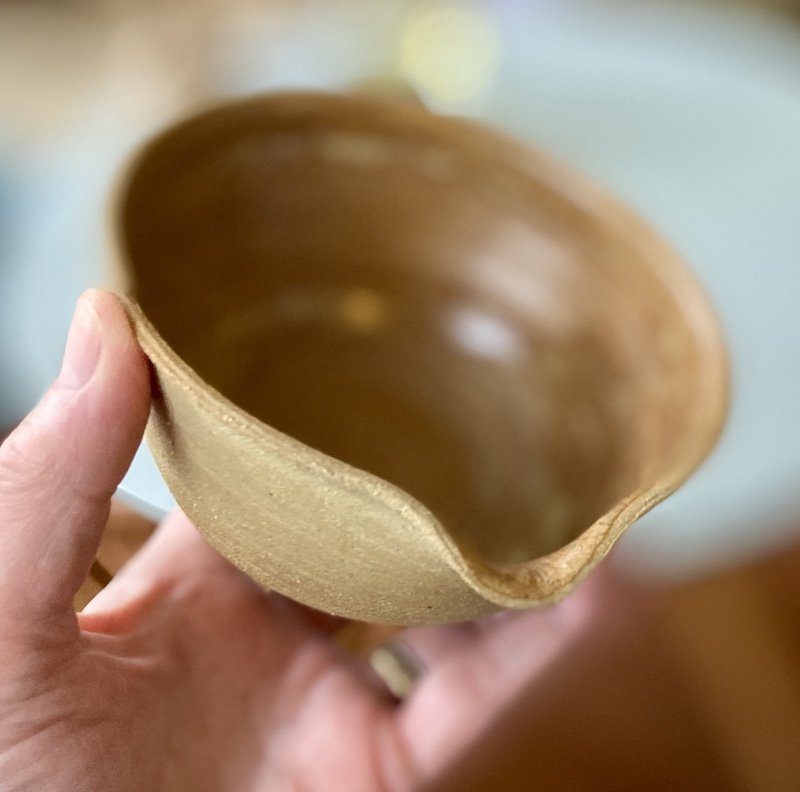 unique, one-off little mixing bowl glossy toffee glaze Natural rough stoneware outside. For salad dressings from kitchen to tableware