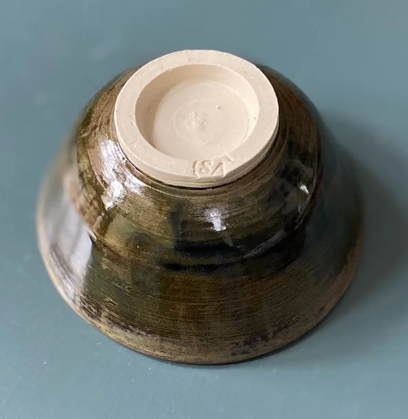 unique hand built small medium bowl. Satin toffee glaze inside with a glossy dark olive effect outside. White stoneware, unique