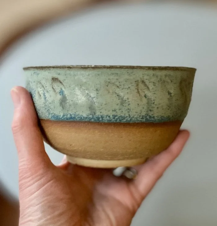 unique hand built medium sized bowl. Subtle blue glaze inside half outside toasted buff stoneware, one-off, hand carved