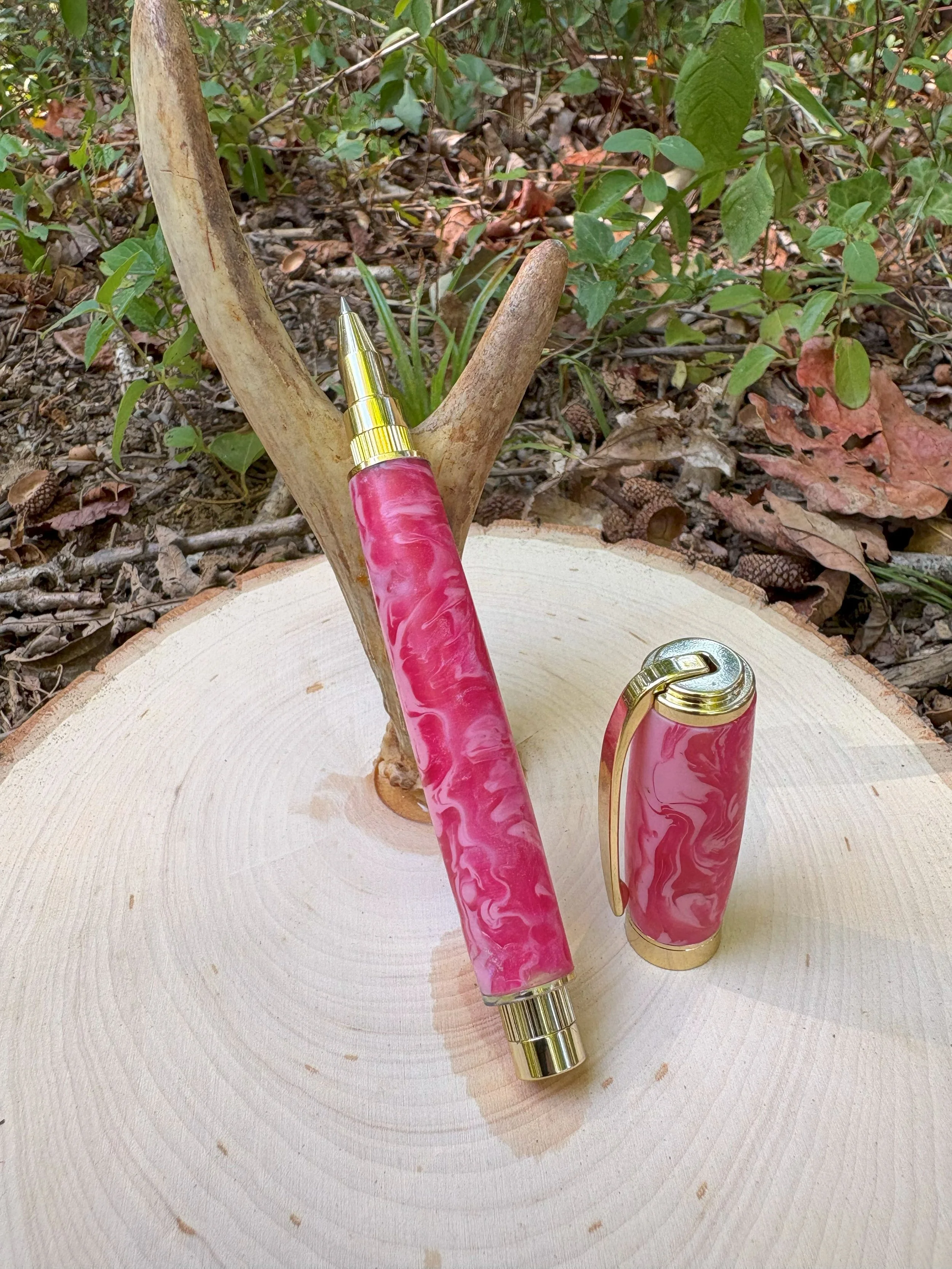 Graduate rollerball pen in gold with pink blush acrylic.