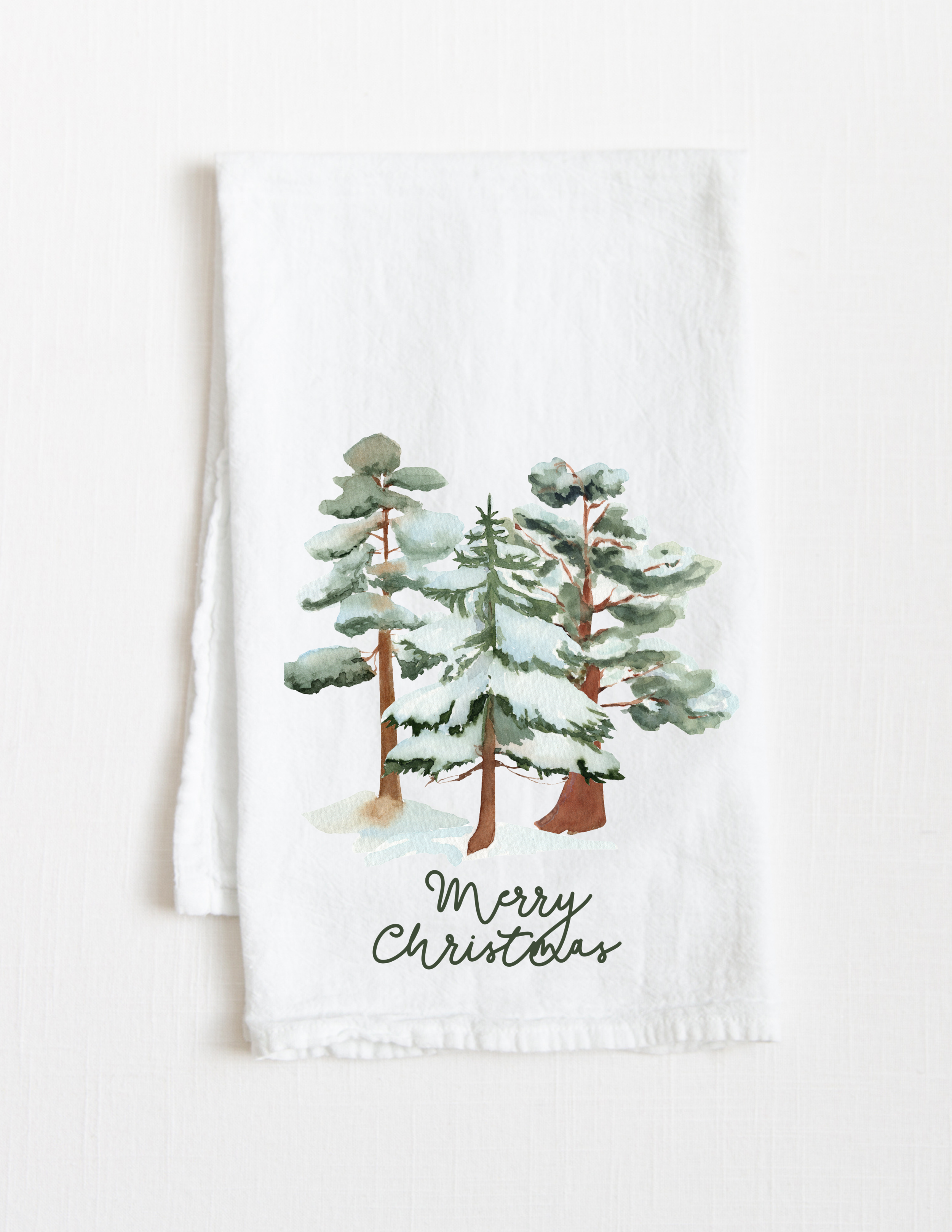 Christmas cotton tea towel with watercolor tree design and Merry Christmas script, holiday kitchen decor product photo on white background