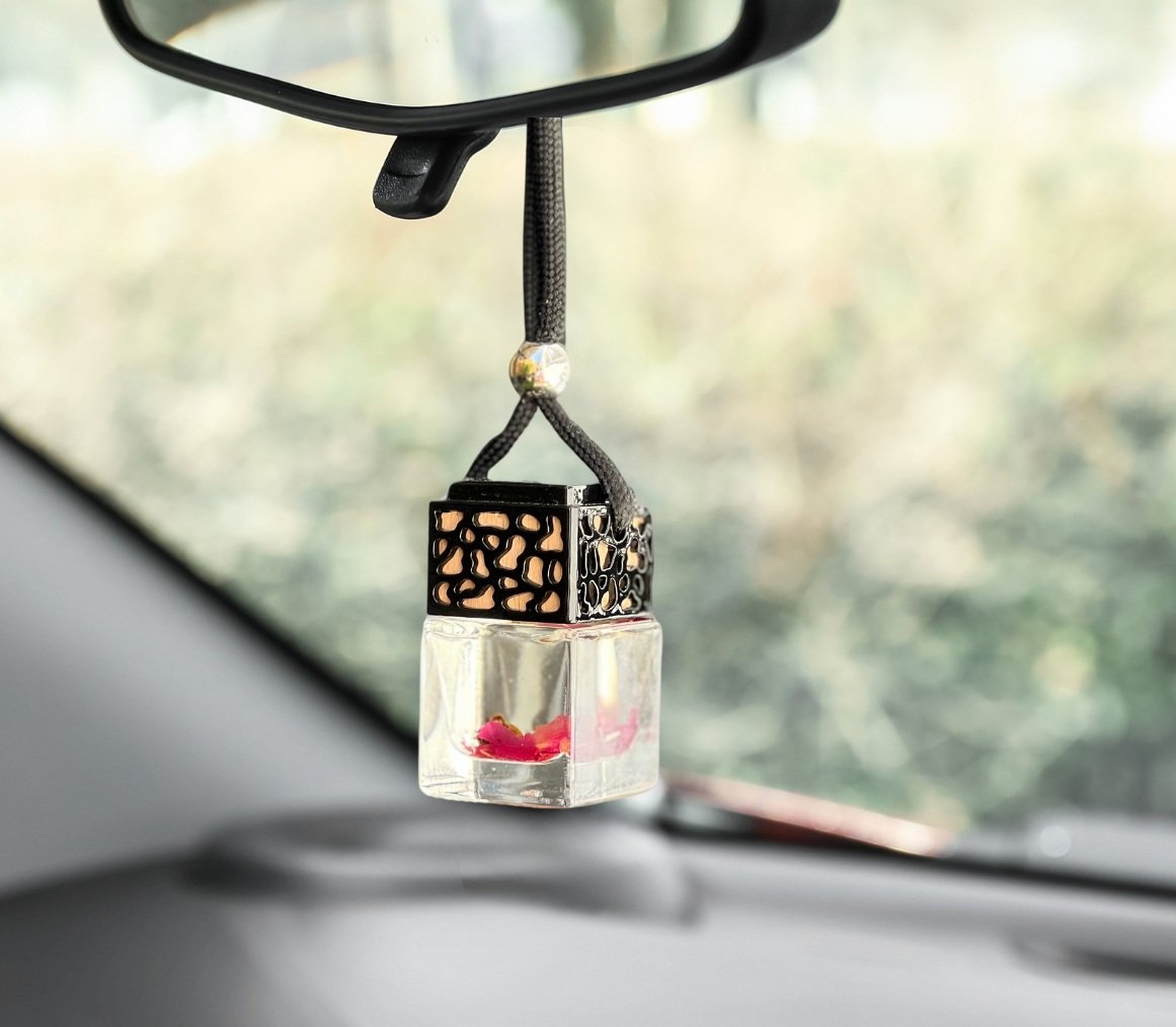 Free Spirit car diffuser hanging from rearview mirror-botanical notes, refillable 8ml design