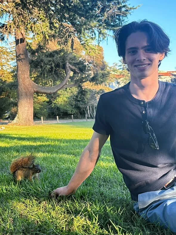 Alexander Paris-Callahan hanging out with a squirrel