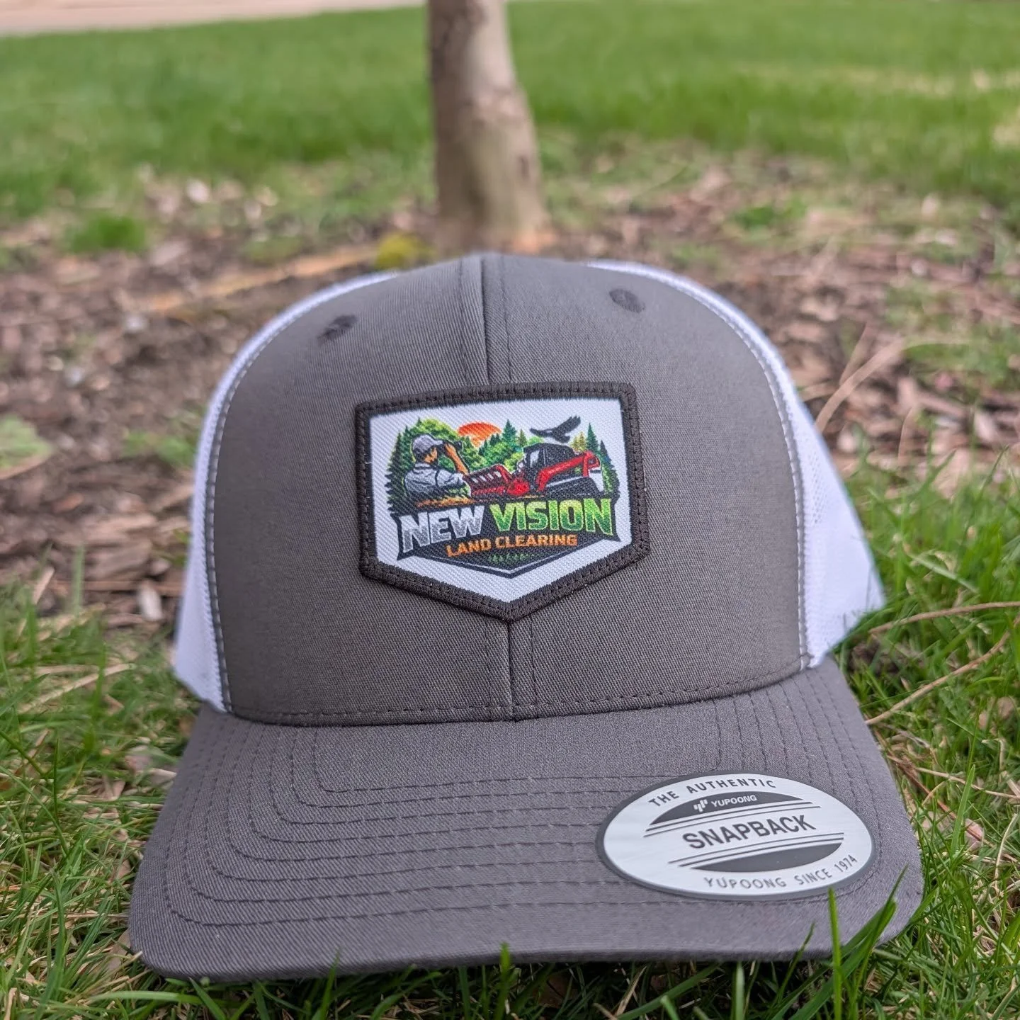 Shout out to New Vision Land Cleaning for the hat and apparel order! 🔥

This upgraded sublimated patch is a total game changer, especially for brands with more detailed or complex logos. Better detail, full adhesive border, and it actually does your