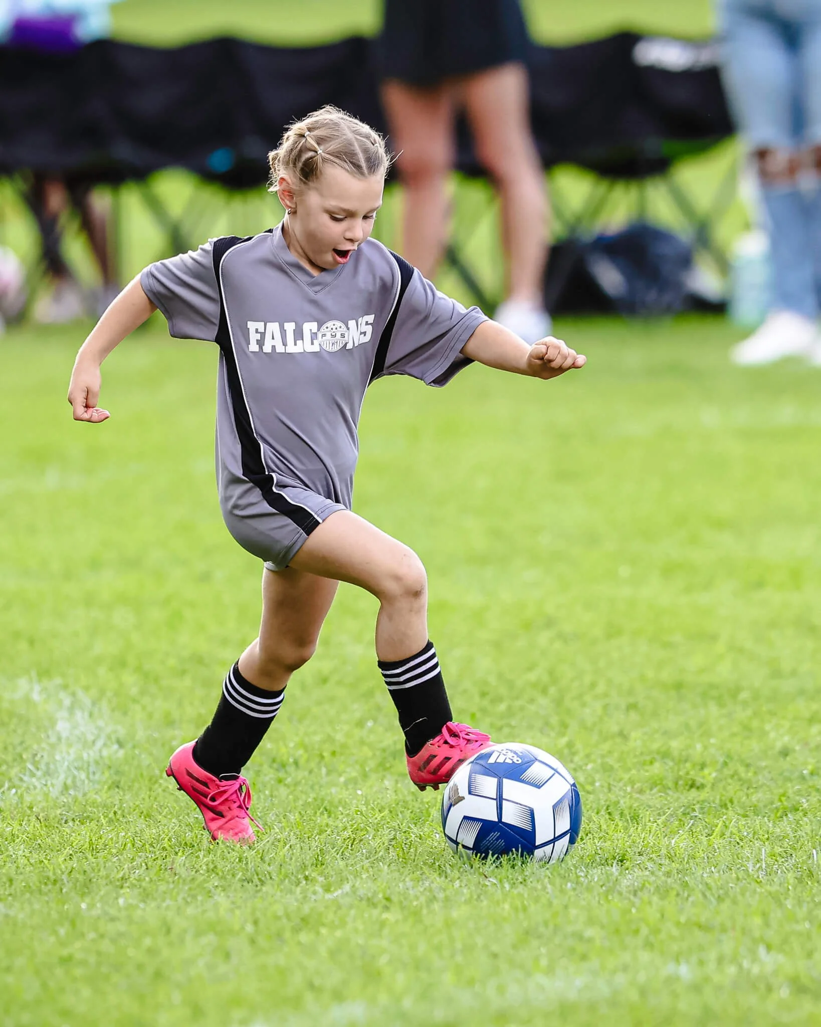 Young soccer player in action during a youth game