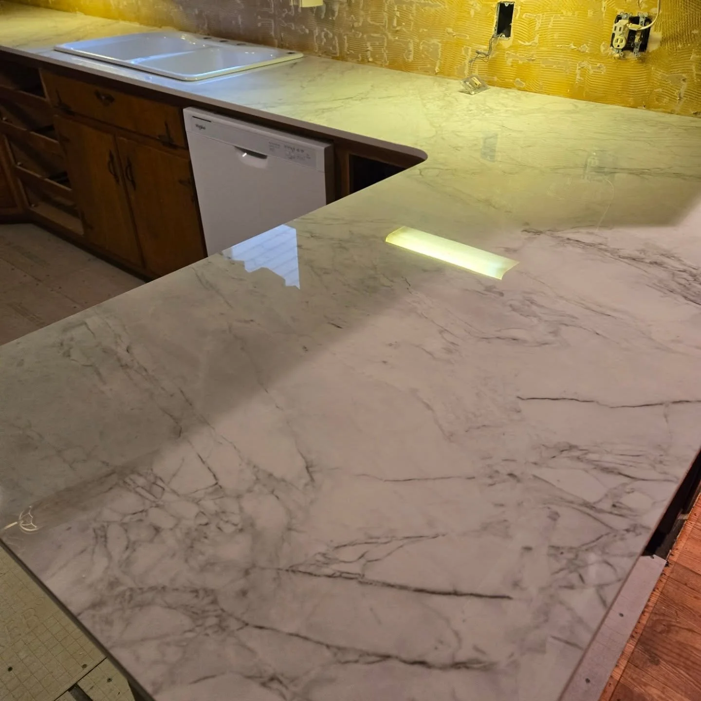 Beautiful dekton quarts countertop in, surround started then flooring!! Customer is crazy stoked!!!